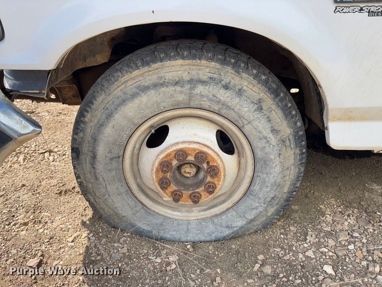 image for item FB3144 1997 Ford F350 flatbed pickup truck