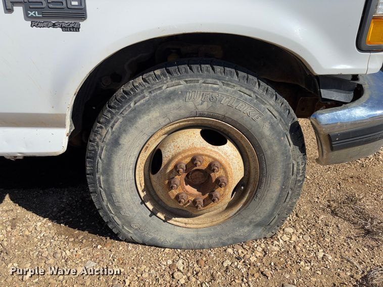 image for item FB3144 1997 Ford F350 flatbed pickup truck