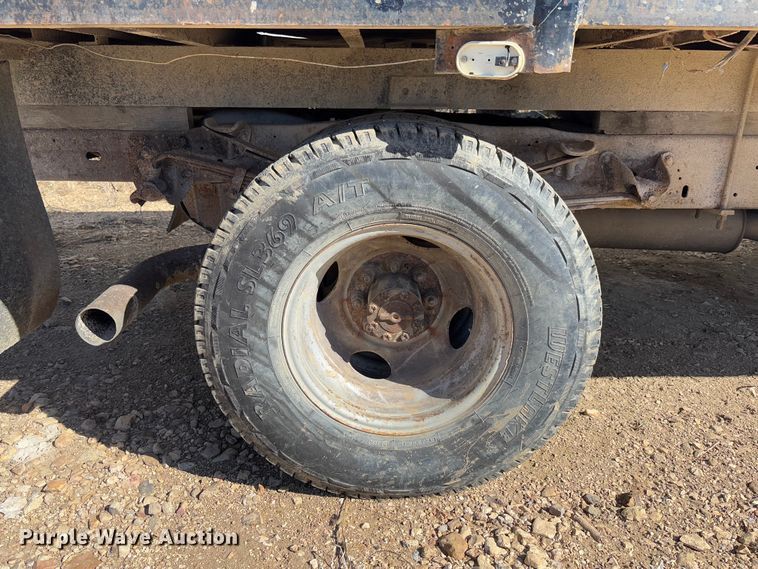 image for item FB3144 1997 Ford F350 flatbed pickup truck