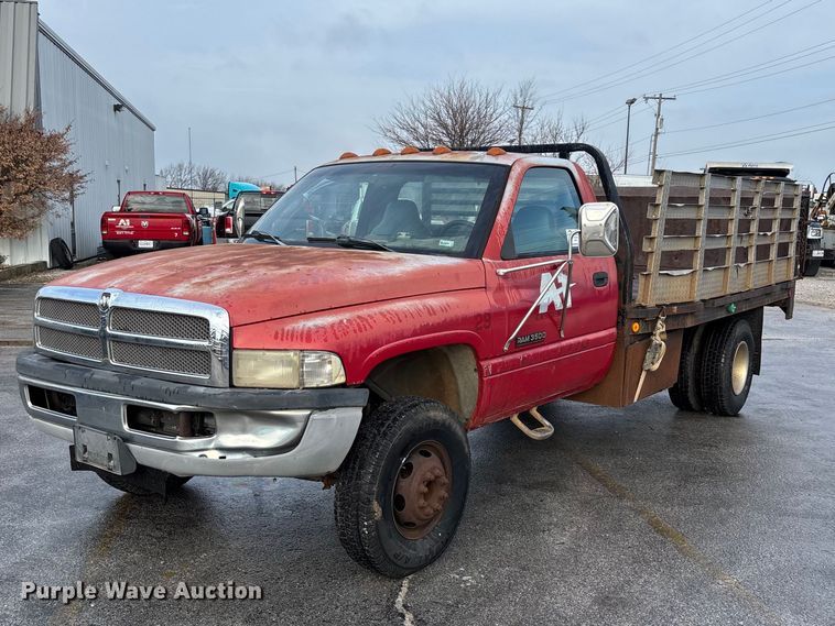 image for item FG0140 2000 Dodge Ram 3500 flatbed pickup truck