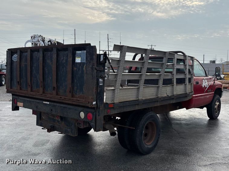 image for item FG0140 2000 Dodge Ram 3500 flatbed pickup truck