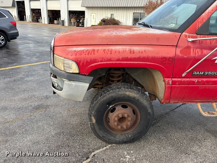 image for item FG0140 2000 Dodge Ram 3500 flatbed pickup truck