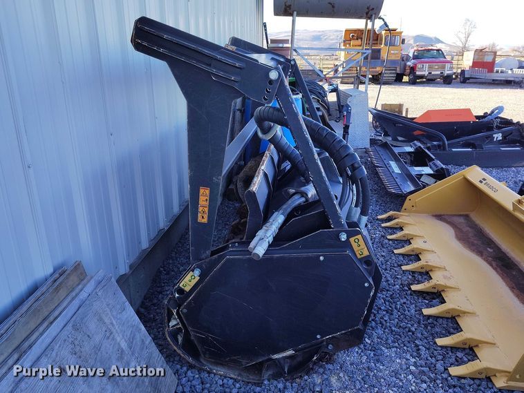 image for item DT0982 2017 Caterpillar HM418C skid steer mulcher