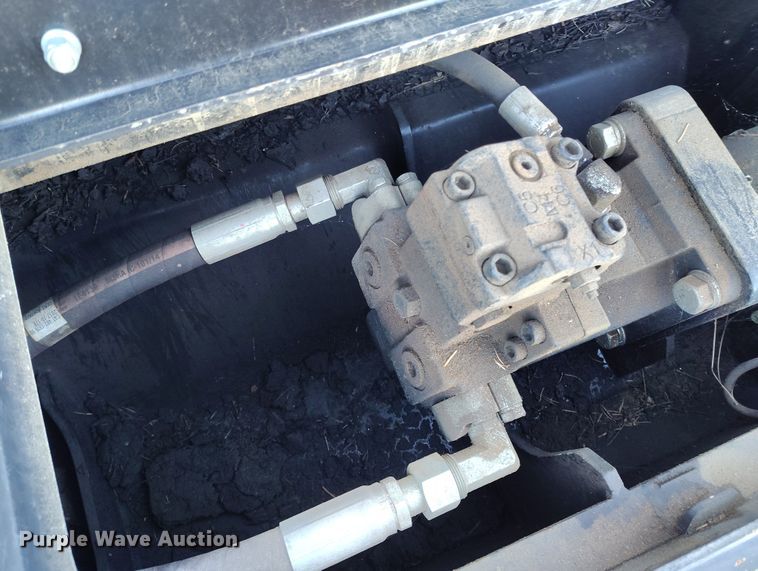 image for item DT0982 2017 Caterpillar HM418C skid steer mulcher