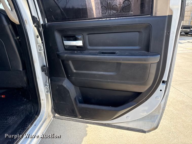 image for item DZ4403 2019 RAM 5500 Crew Cab flatbed truck