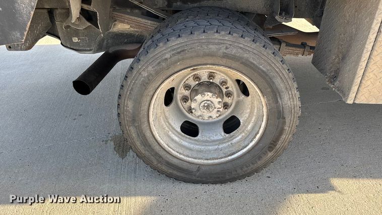 image for item DZ4403 2019 RAM 5500 Crew Cab flatbed truck