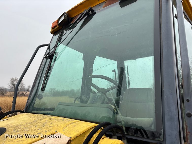 image for item EA4494 2000 New Holland 675E backhoe