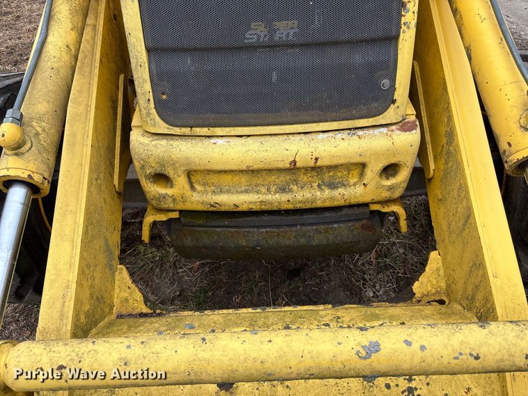 image for item EA4494 2000 New Holland 675E backhoe