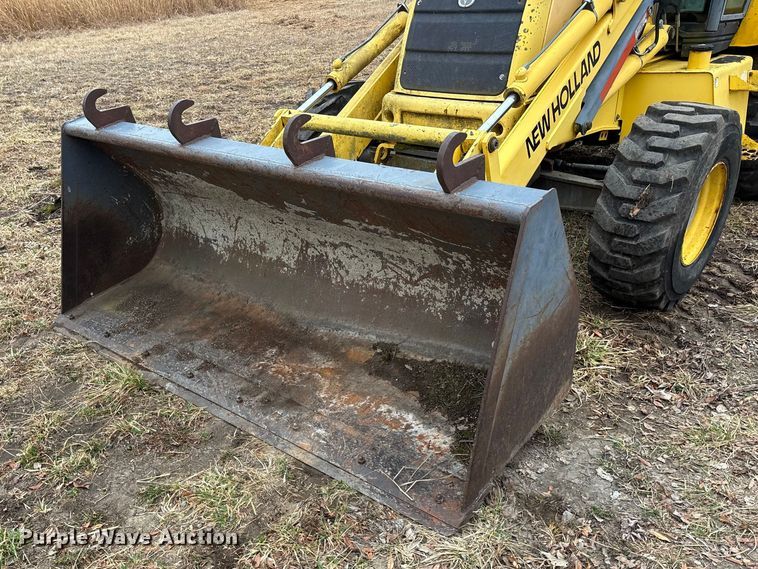 image for item EA4494 2000 New Holland 675E backhoe