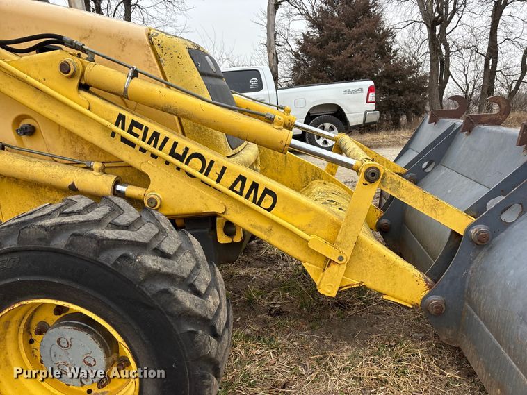 image for item EA4494 2000 New Holland 675E backhoe