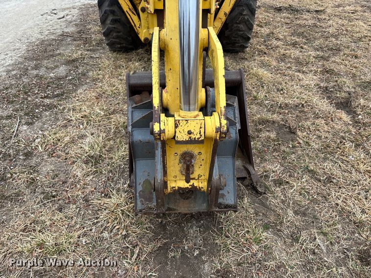 image for item EA4494 2000 New Holland 675E backhoe