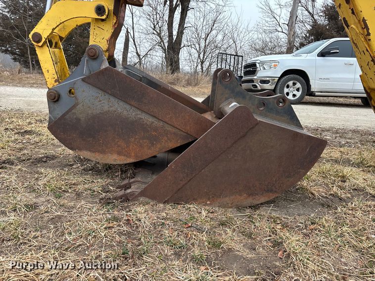 image for item EA4494 2000 New Holland 675E backhoe