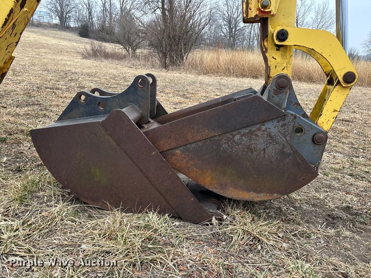 image for item EA4494 2000 New Holland 675E backhoe