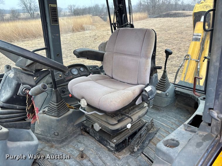 image for item EA4494 2000 New Holland 675E backhoe