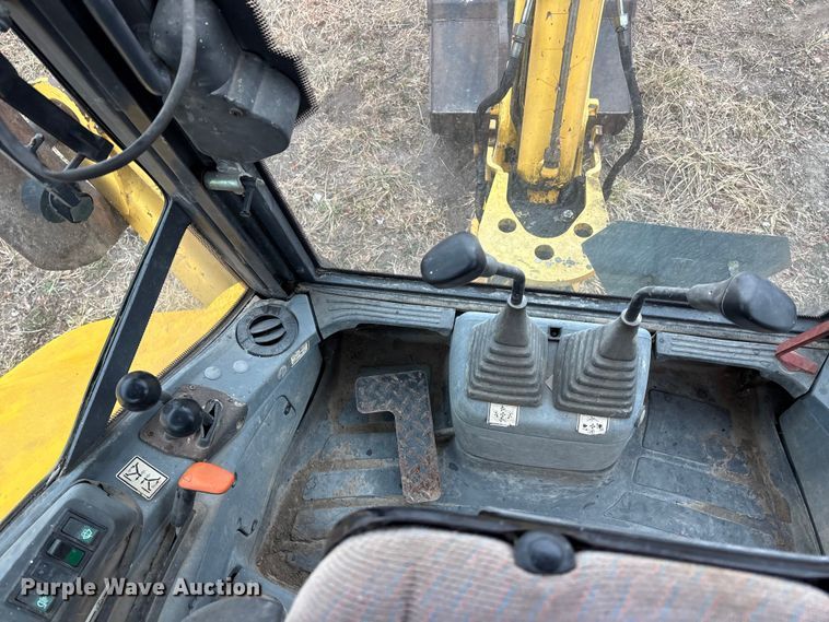 image for item EA4494 2000 New Holland 675E backhoe