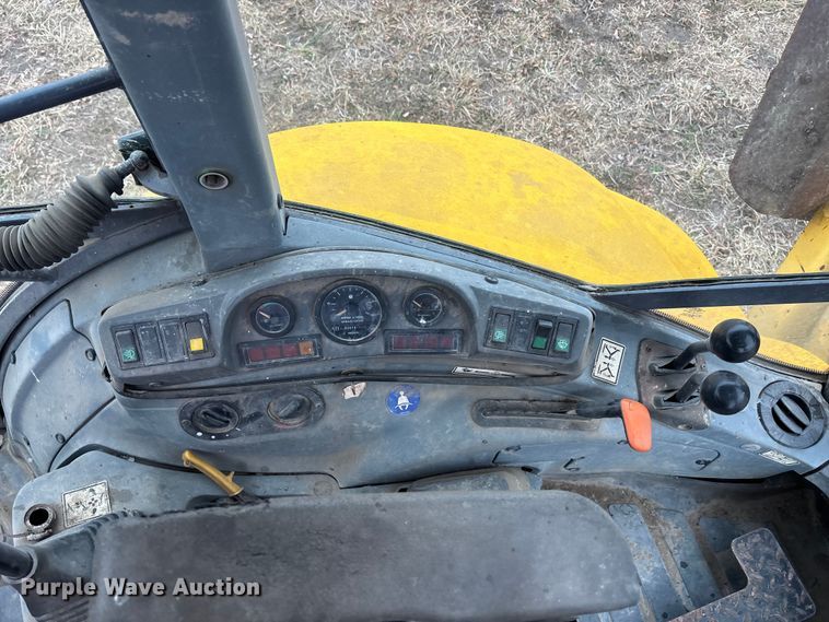 image for item EA4494 2000 New Holland 675E backhoe