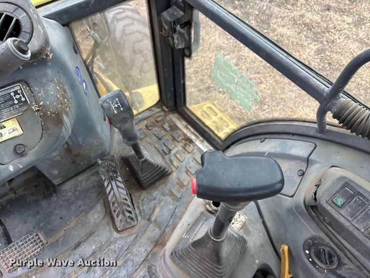 image for item EA4494 2000 New Holland 675E backhoe
