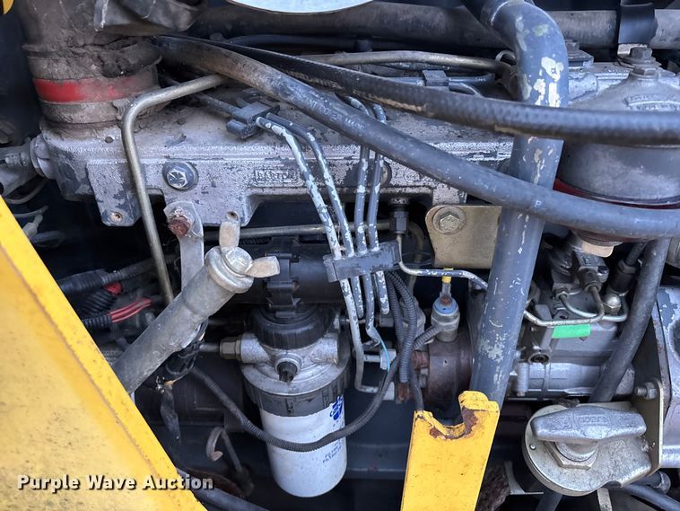 image for item EA4494 2000 New Holland 675E backhoe