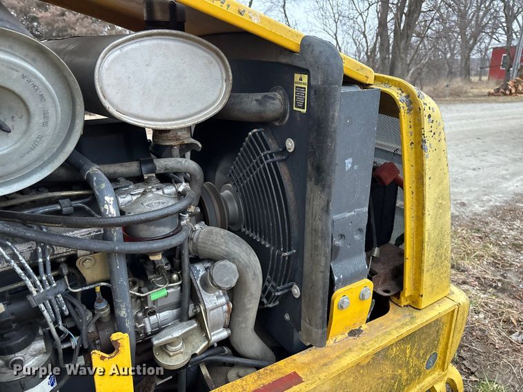 image for item EA4494 2000 New Holland 675E backhoe