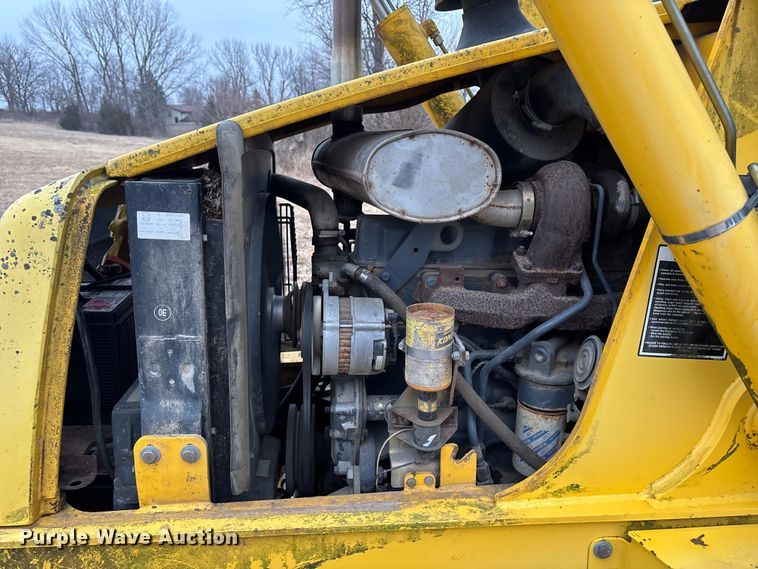 image for item EA4494 2000 New Holland 675E backhoe