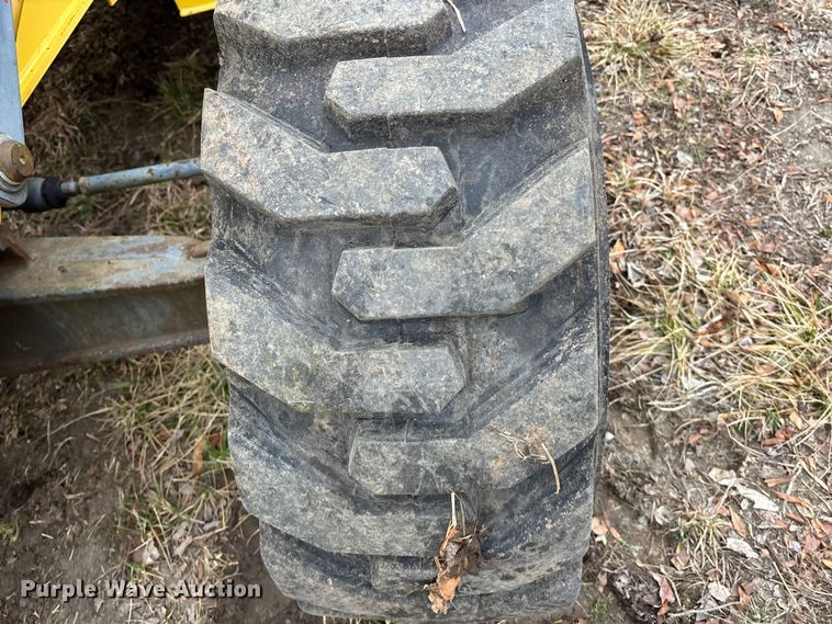 image for item EA4494 2000 New Holland 675E backhoe