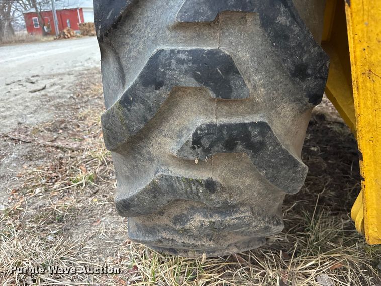 image for item EA4494 2000 New Holland 675E backhoe