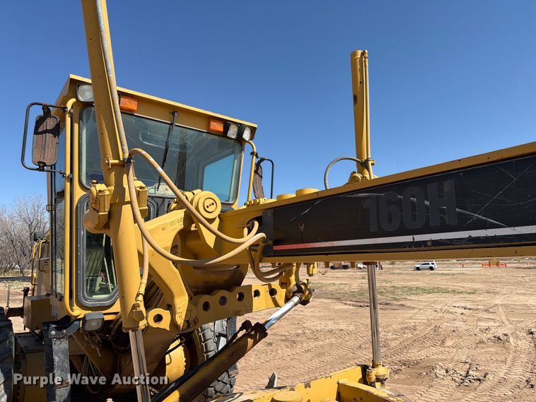 image for item ED5165 1999 Caterpillar 160H motor grader