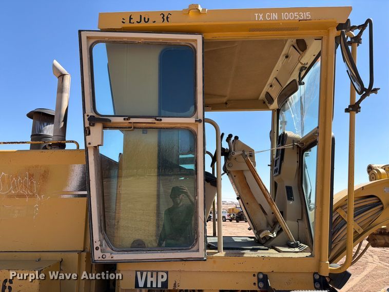 image for item ED5165 1999 Caterpillar 160H motor grader