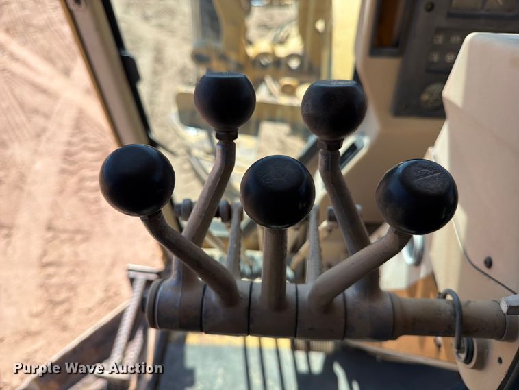 image for item ED5165 1999 Caterpillar 160H motor grader