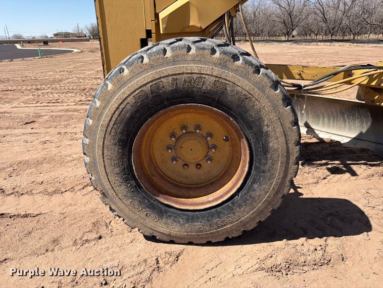 image for item ED5165 1999 Caterpillar 160H motor grader