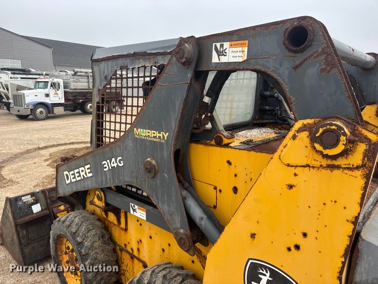 image for item ET1655 2015 John Deere 314G skid steer loader