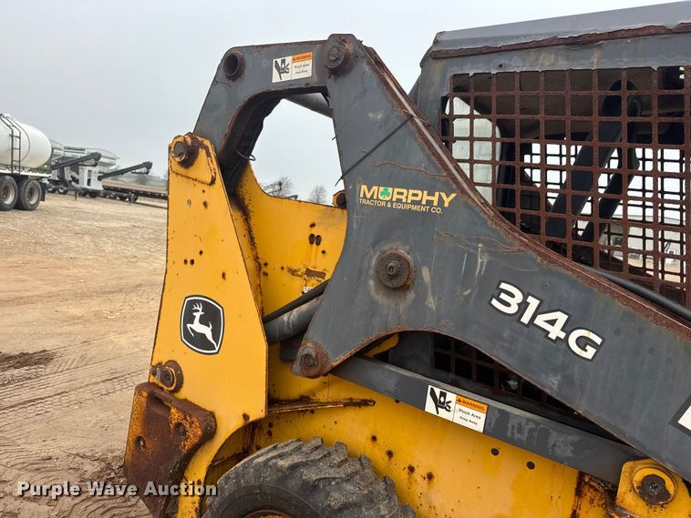 image for item ET1655 2015 John Deere 314G skid steer loader