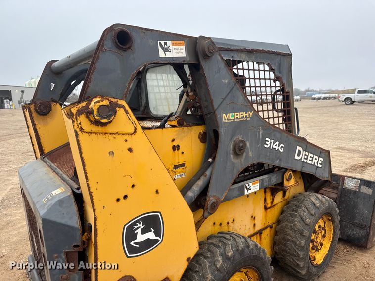 image for item ET1655 2015 John Deere 314G skid steer loader