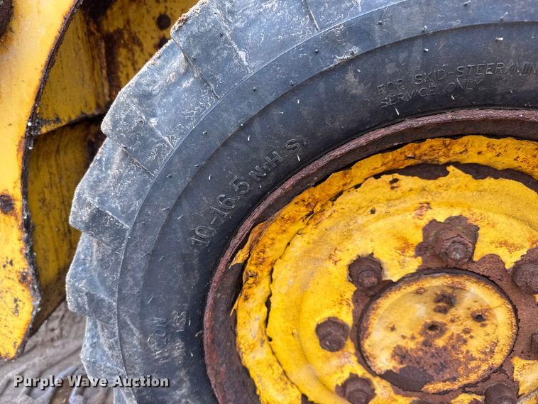 image for item ET1655 2015 John Deere 314G skid steer loader