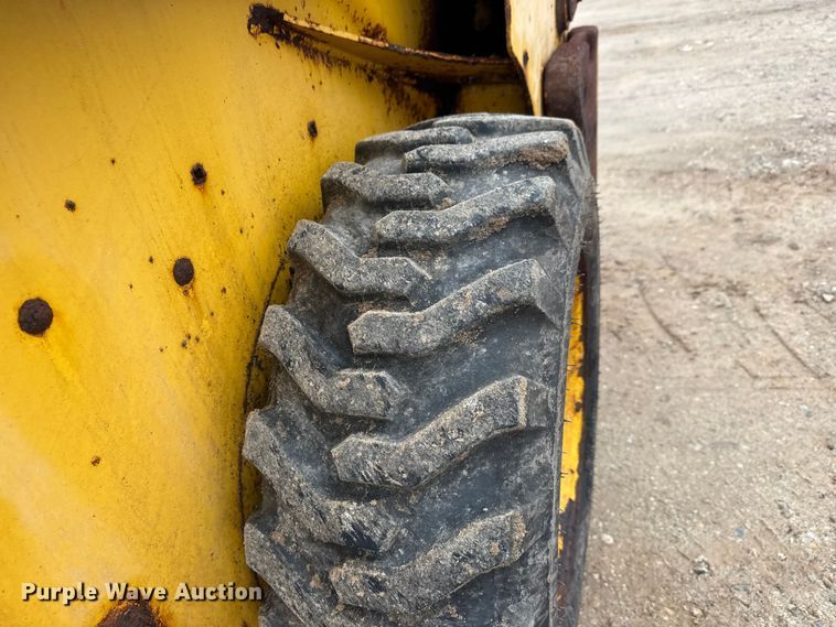 image for item ET1655 2015 John Deere 314G skid steer loader