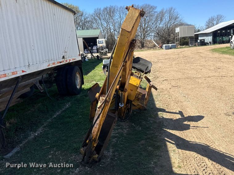 image for item ET1675 Long 1199 A skid steer backhoe