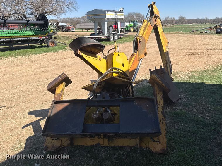 image for item ET1675 Long 1199 A skid steer backhoe