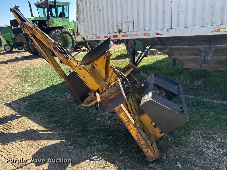 image for item ET1675 Long 1199 A skid steer backhoe