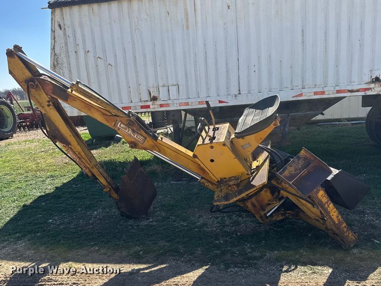 image for item ET1675 Long 1199 A skid steer backhoe