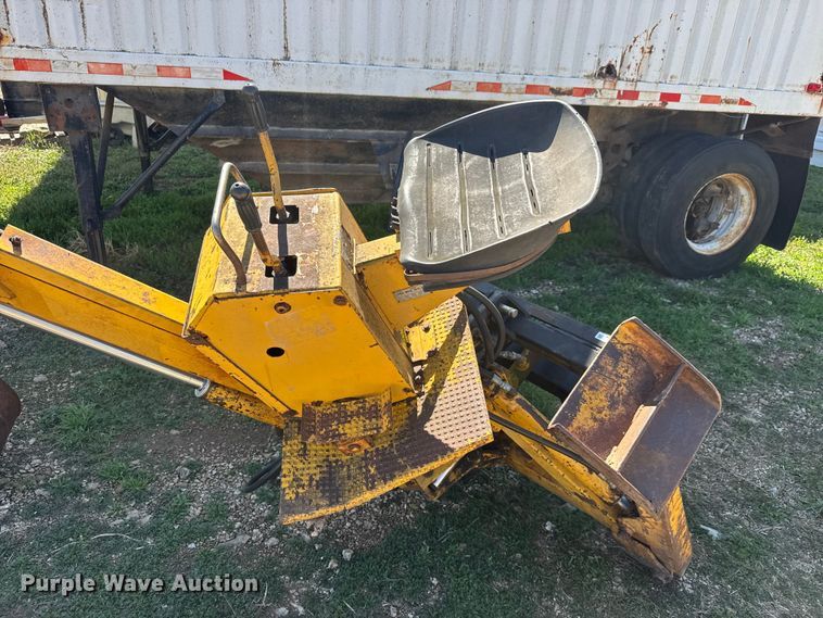 image for item ET1675 Long 1199 A skid steer backhoe