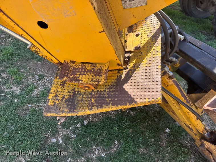 image for item ET1675 Long 1199 A skid steer backhoe