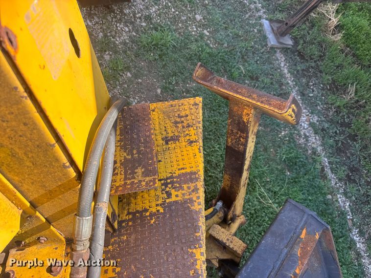 image for item ET1675 Long 1199 A skid steer backhoe