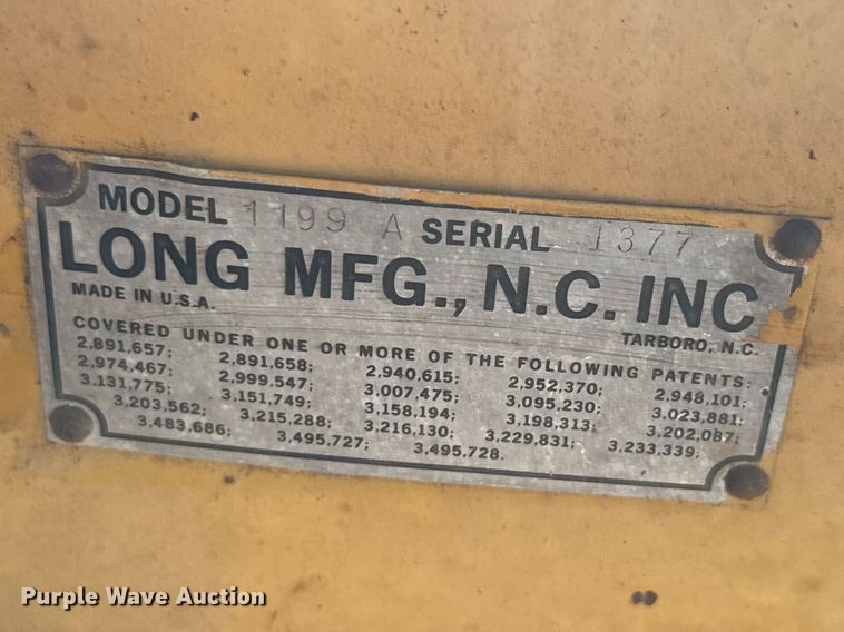 image for item ET1675 Long 1199 A skid steer backhoe