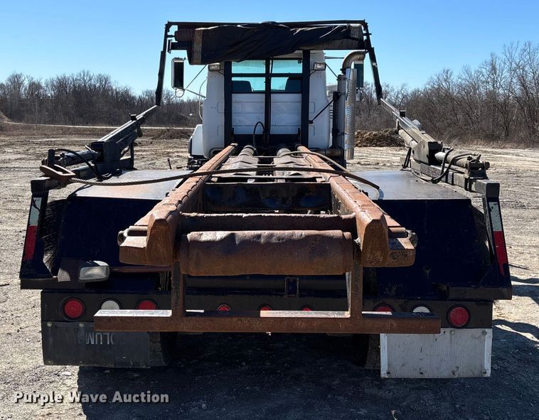 image for item FB3073 1999 Mack RD688S roll-off container truck