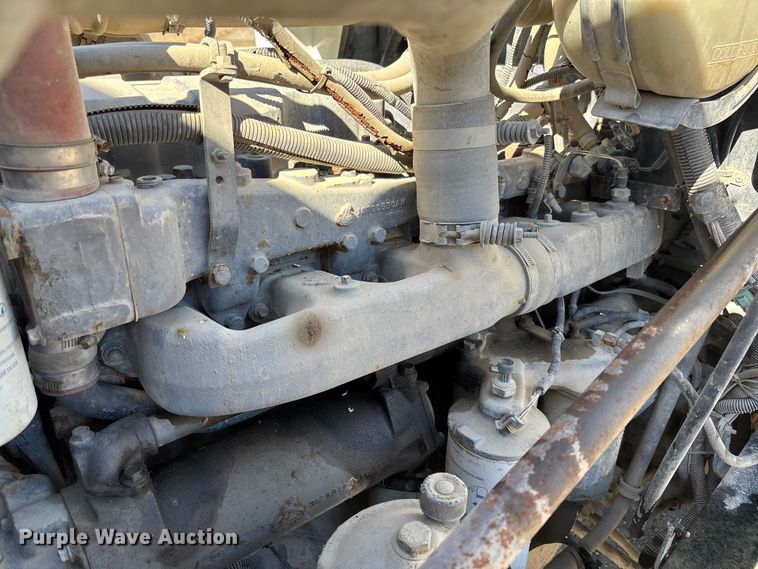 image for item FB3073 1999 Mack RD688S roll-off container truck