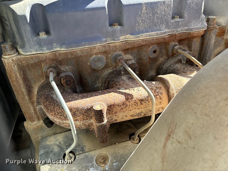 image for item FB3073 1999 Mack RD688S roll-off container truck