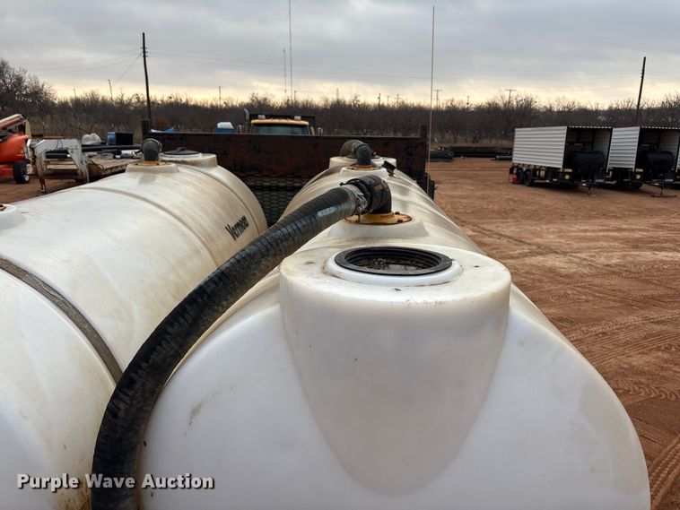 image for item FC2036 2006 Freightliner Business Class M2 flatbed truck with mud mixing truck