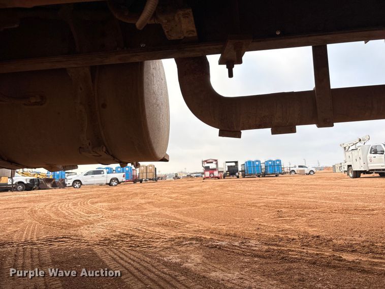 image for item FC2036 2006 Freightliner Business Class M2 flatbed truck with mud mixing truck