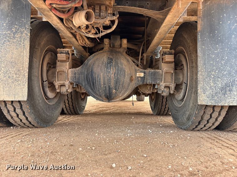 image for item FC2036 2006 Freightliner Business Class M2 flatbed truck with mud mixing truck