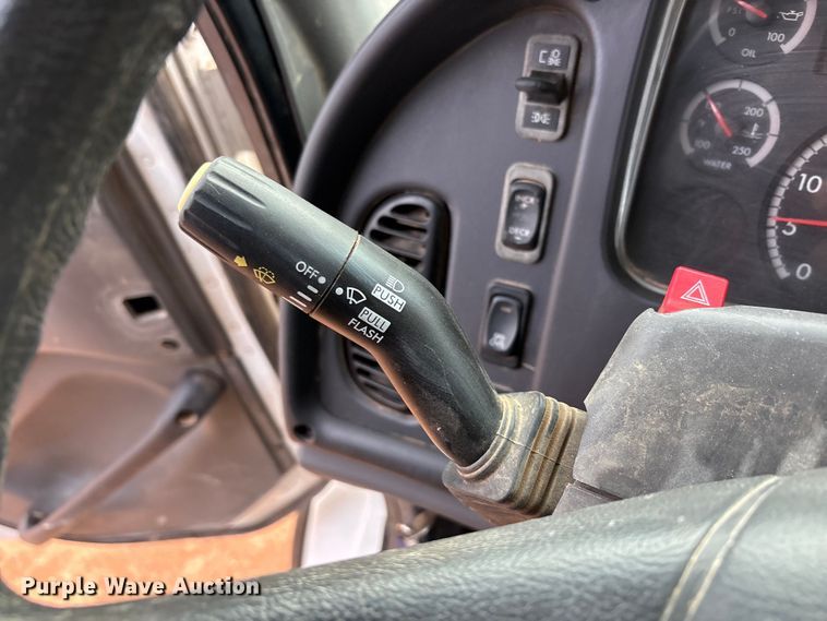 image for item FC2036 2006 Freightliner Business Class M2 flatbed truck with mud mixing truck